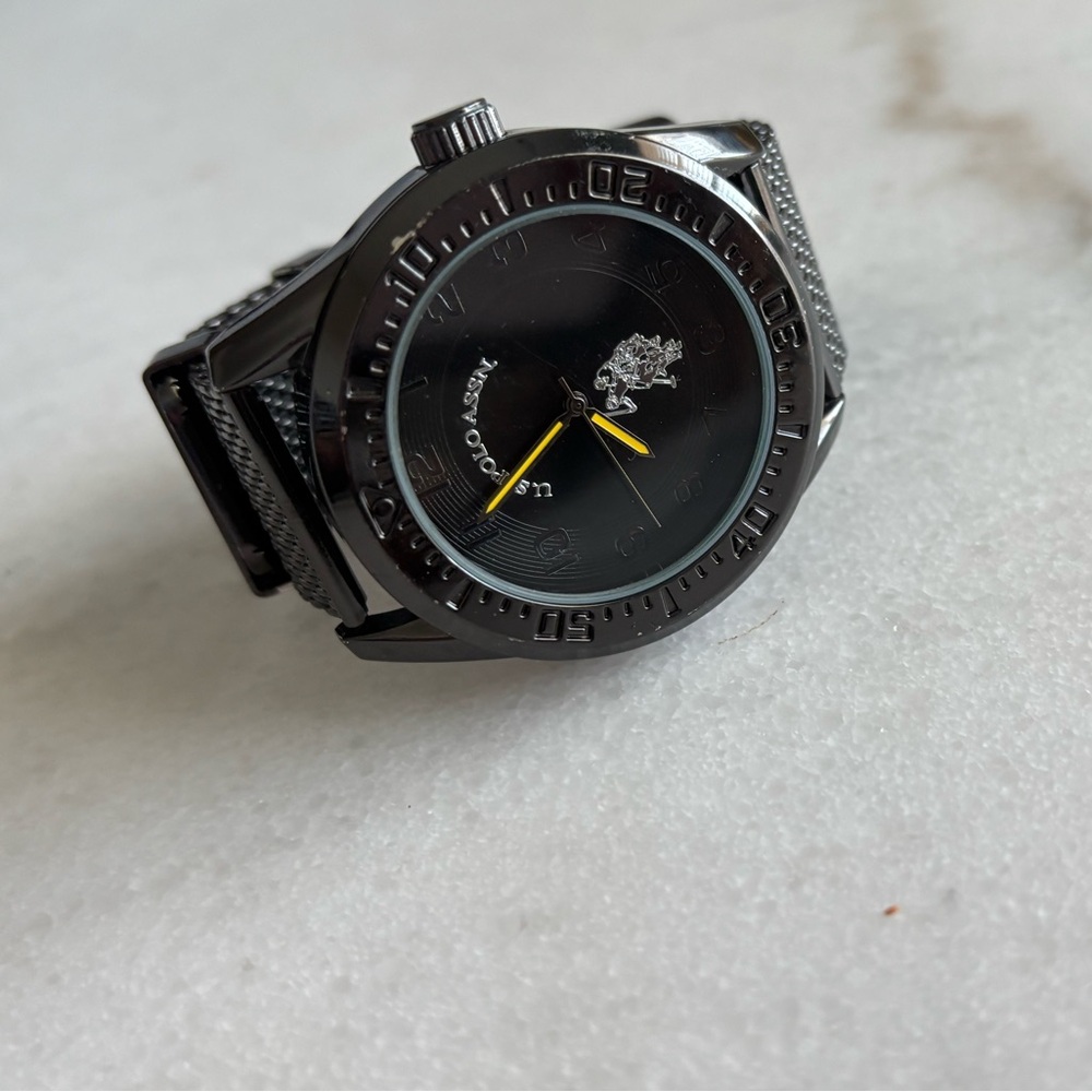 Black U.S Polo Association stainless steel watch with yellow accent